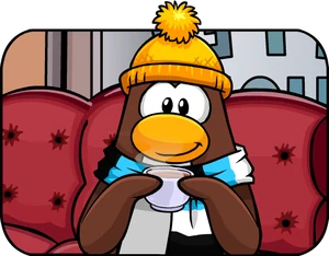 A penguin in a yellow beanie relaxing on a red sofa